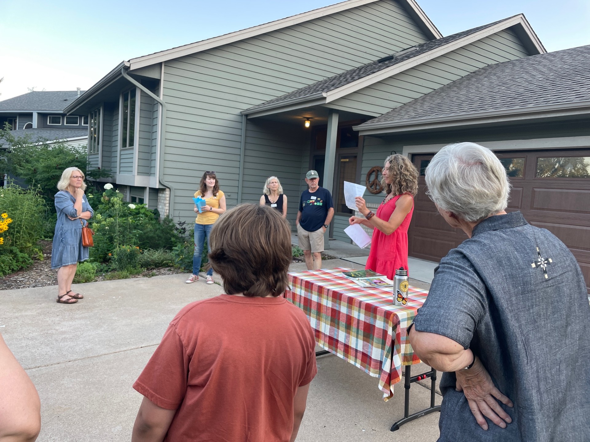 Watershed Award winner shares garden plans during the August 2025 Neighborhood Garden Tour event. 